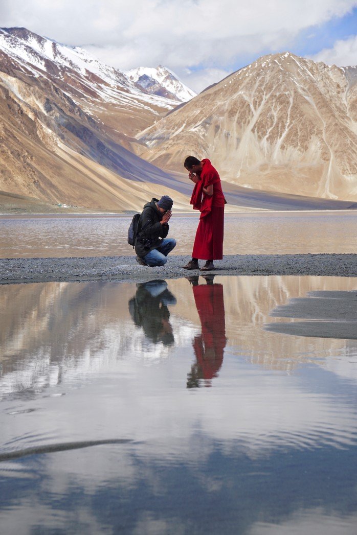 buddhist-man-pay-respect-to-monk-at-pangong-lake-ladakh-jammu-and-kashmir-india