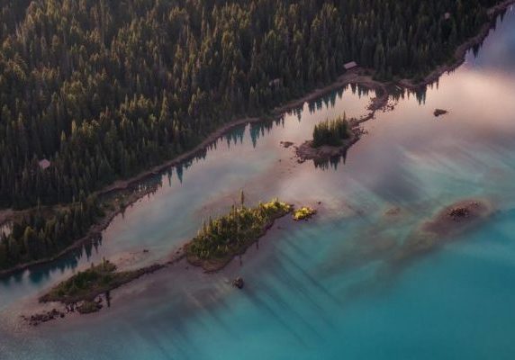 Aerial view of beautiful Glacier Lake in Canadian Mountain Landscape during a vibrant sunset. Taken in Garibaldi, near Squamish and Whistler, North of Vancouver, BC, Canada.